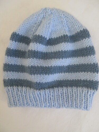 %%Handknit Adult Hat%%, Made and donated by Anne Morris, Peterborough, NH; Size small; Chunky washable wool blend; Two shades of blue stripes.