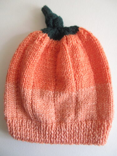 %%Hand Knitted Hat (1)%%, Made and donated by Ellen Orkins; Youth Size 8-12; Orange Ombre Pumpkin.