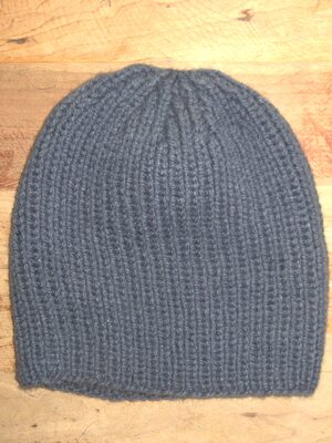 %%Hand Knitted Hat (2)%%, Made and donated by Ellen Orkins; Youth Size 10-12; 100% Alpaca Yarn; Blue; Ribbed Stitch.