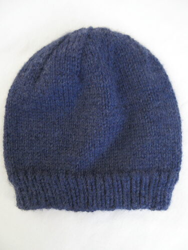 %%Handknit Adult Hat%%, Made and donated by Anne Morris, Peterborough, NH; Size small; Chunky washable wool blend; Blue.