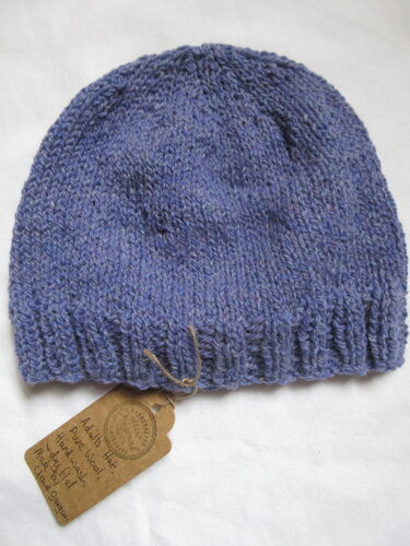 %%Handknitted Adult Hat%%, Made and donated by Claire Gargan; Pure wool; Hand wash & dry flat.