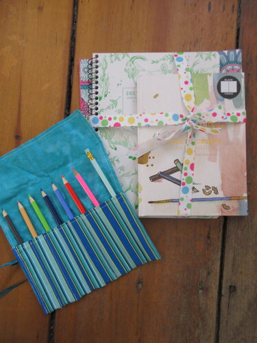 %%Journal/Art Set%%, Donated by Cathy Shanahan; Includes: Colored Pencil Roll-up; Decomposition book; Calming Coloring Book; Blank Journal.