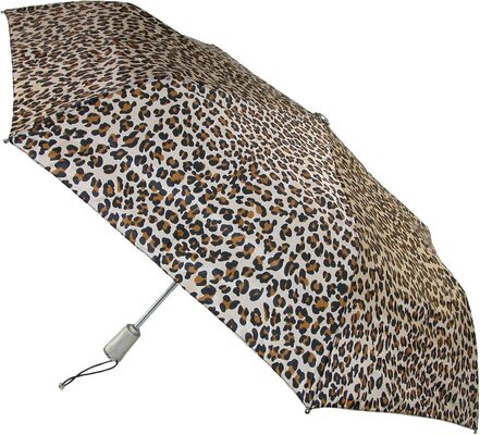 %%Totes Travel Umbrella%%, Donated by Cathie Breau, New with tags; Leopard Spot design; Lightweight, auto open close, large canopy foldable umbrella allows for easy one-handed operation, and sun protection blocks harmful UV rays; Our invisible coating on the umbrella canopy allows rain to roll right off for superior water repellency, durability and defense against the elements; Canopy Size: 43-inches; folds to 11-inches when closed.