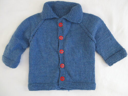%%Handknit Collared Infant Sweater%%, Made and donated by Anne Morris, Peterborough, NH; Approximate size 9-12 months; Washable DK weight yarn; 75% acrylic and 25% wool; Blue with red buttons.
