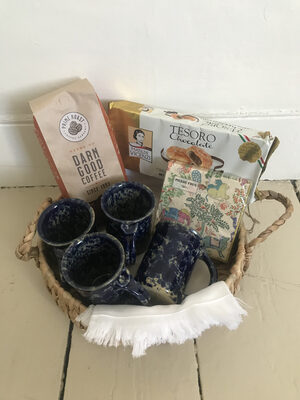 %%Coffee Themed Basket%%, Donated by Mary Kate Long and Karen Coteleso; Contains: 4 Bennington Potter Stoneware Pottery blue agate mugs, tea towel, decorative napkins; 1 lb. Prime Roast Coffee, cookies.