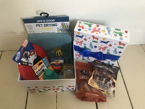 %%Dog Themed Box%%, Donated by Mary Kate Long and Karen Coteleso; Contains: Pet drying towel, dog treats and toys, and poop bags.