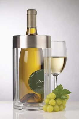 %%Prodyne Iceless Wine Cooler%%; Donated by Heather Dalrymple; Brand new in box; Capicity: 1.6 quarts; Dimensions: 4.5x4.5x9.25 inches; Keep your wine chilled for hours without ice. Just place pre-chilled bottle in the cooler. The double wall design allows an insulated chamber of cold air to be created from the chill of the bottle. No ice, no mess, no wet label. Made from thick, durable, crystal-clear acrylic with stylish wide band brushed stainless steel rim.