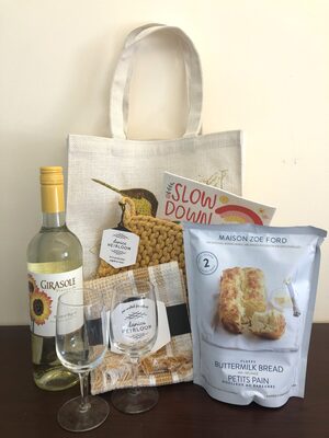 %%Wine and Kitchen Delights Gift Set%%, Donated by the Upton Family; Bottle of Girasole Vineyards Organic Pinot Blanc (voted 96 points by Sunset International Wine Competition and 90 points by Wine&Spirits); Fluffy Buttermilk Bread Mix; Waffle Dish Towel; Knit Potholder/Trivet; Reusable Eco-Friendly Dish Cloth; Wine Glass Set; Woven Gift Bag.