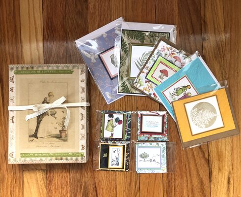 %%Handmade Stationery Gift Box Set%%, Donated by Paperwhite Studio, Swanzey, NH; A beautiful selection of handmade greeting cards in a variety of whimsical, nature inspired prints and colors; Includes 5 large cards (approximate sizes 5"x5" to 5"x7") and 4 small cards (sizes 2.5"x2.5"); All cards include an envelope and are blank inside - perfect for any occasion; Gift set is packaged in a gift box with vintage floral inspired artwork; All items are created locally by Paperwhite Studio. Studiopaperwhite@gmail.com
