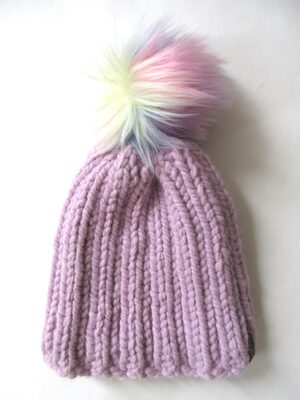 %%Handknit Hat%%, Made and donated by Alyssa Nykanen; Size: Child/Small Adult; Color: Purple with multicolor removeable pom-pom; Yarn: Wood/Acrylic.