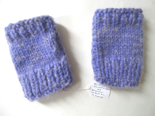 %%Handknit Fingerless Gloves%%, Made and donated by Alyssa Nykanen; Size: Adult; Yarn: 70% merino, 30% superfine alpaca AND 80% kid mohair, 11% Merino wool, 9% polyamide; Color: Purple.